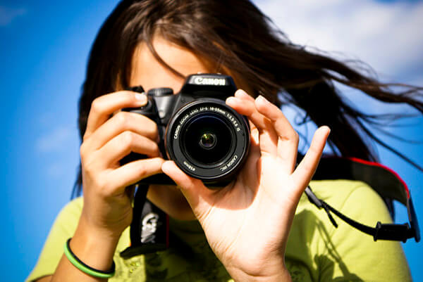 Girl taking a photograph